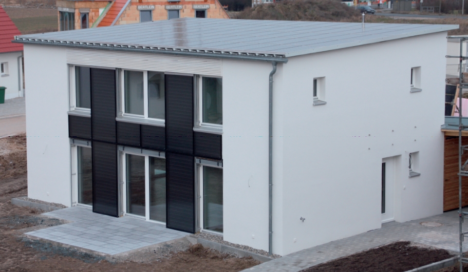 Example of a “Nearly Zero-Energy” building with photovoltaic system on roof and solar thermal system on front façade (source: Arch Wimmer – schulze darup & partner)